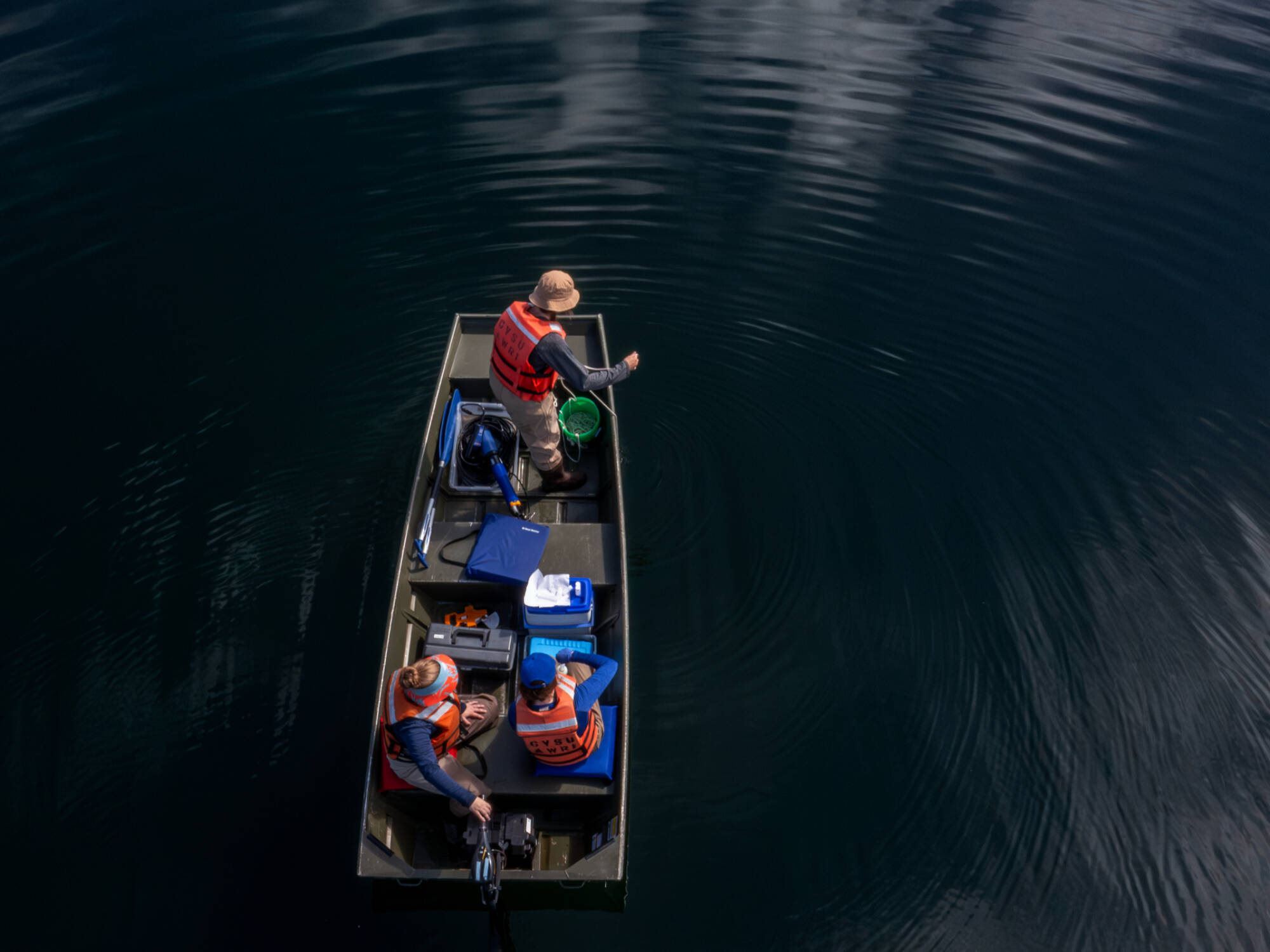 GVSU student scholars students on boat in the water